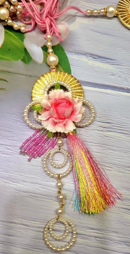 PINK FLOWER TASSEL LUMBA RAKHI