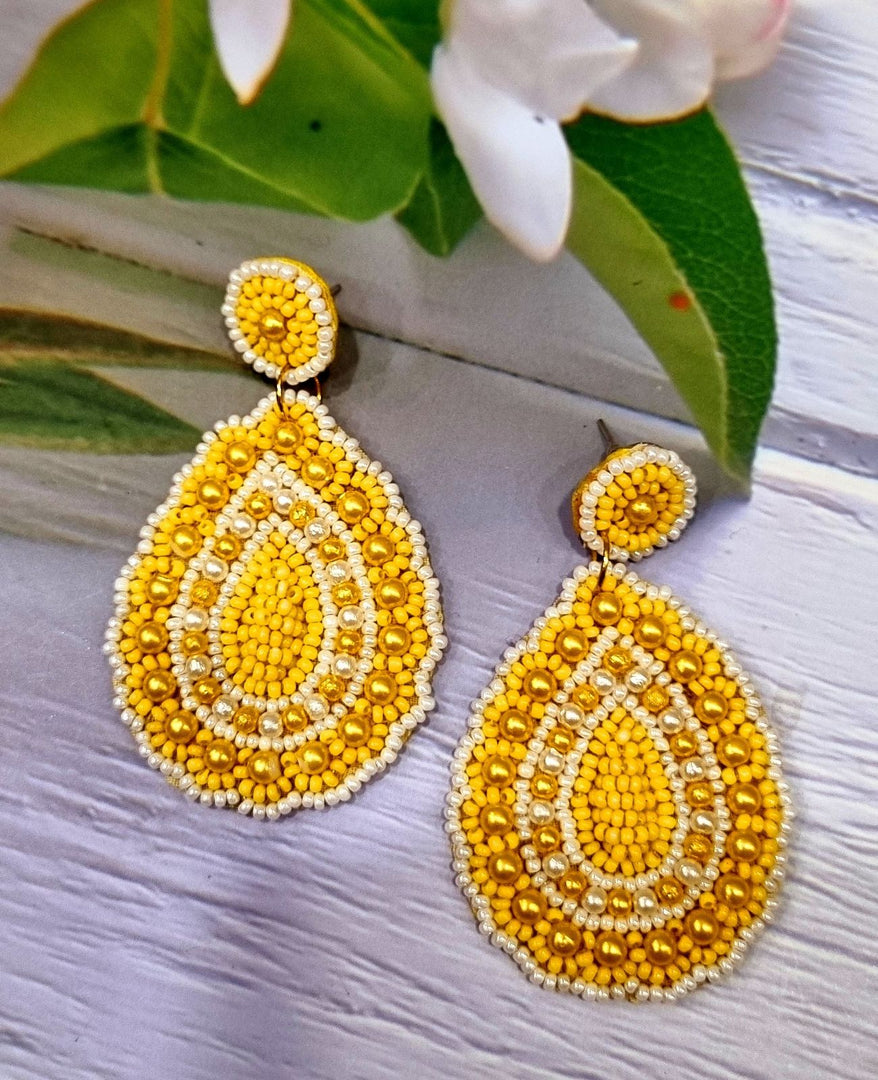 YELLOW OVAL SHAPED BEADED EARRINGS